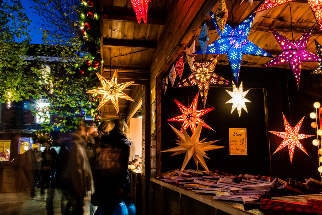 A Christmas Market Stall in York, selling star shaped decorations.