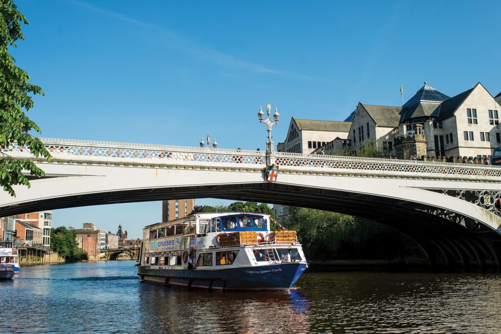 Logo,  Logo,  Boat,  Bridge,  Building,  Transportation,  Vehicle,  Vessel,  Water,  Watercraft,  Boat,  Canal,  Ferry,  Outdoors,  Vehicle,  Water,  Watercraft,  Waterfront