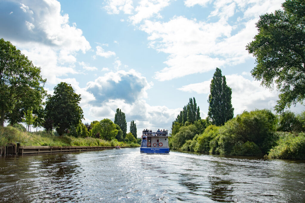 Logo,  Boat,  Canal,  Nature,  Outdoors,  Scenery,  Tree,  Vehicle,  Water
