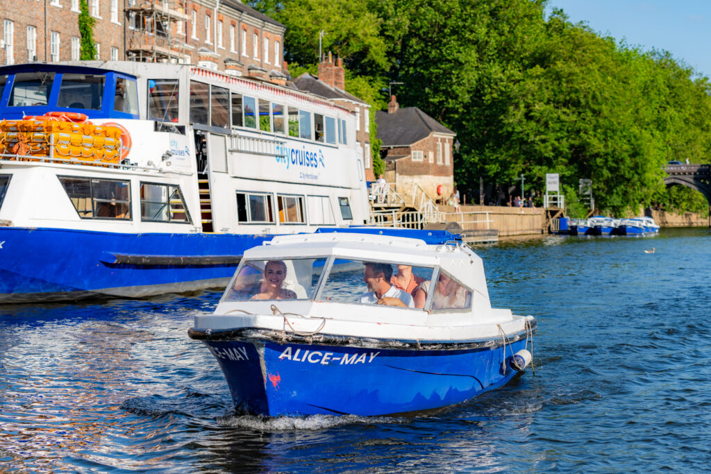 Logo,  Boat,  Boating,  Person,  Vehicle,  Water,  Water Sports,  Watercraft,  Waterfront