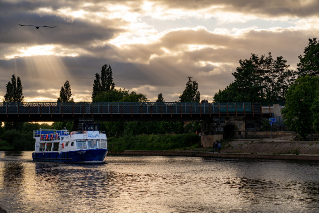 Logo,  Logo,  Boat,  Ferry,  Human,  Person,  Transportation,  Vehicle,  Boat,  Ferry,  Person,  Tree,  Vehicle,  Water,  Watercraft,  Waterfront
Logo,  Boat,  Ferry,  Human,  Person,  Transportation,  Vehicle
